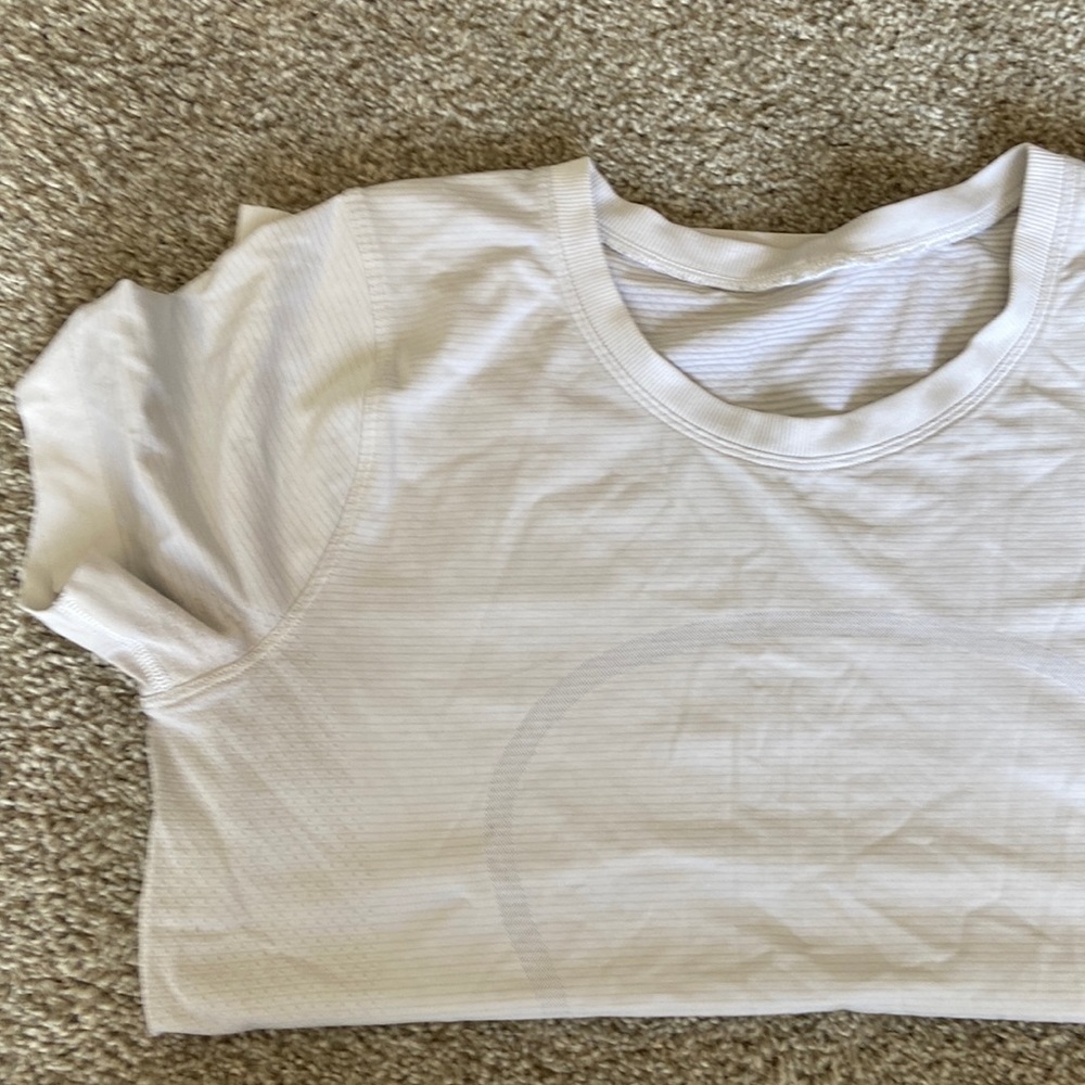Swiftly Relaxed fit short sleeve white top. Size 6 great condition.